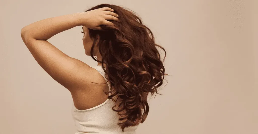 Woman with full thick hair after a hair transplant