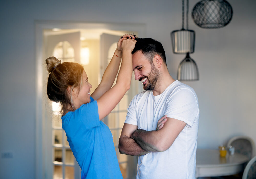 Couple happy with hair loss treatment