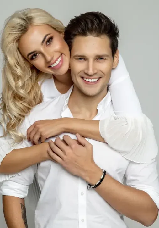 Portrait of beautiful cheerful couple with great hair