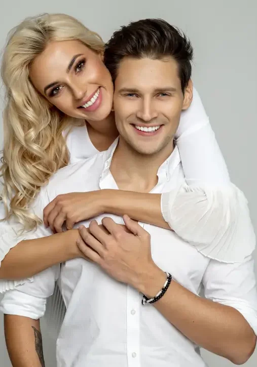 Portrait of beautiful cheerful couple with great hair